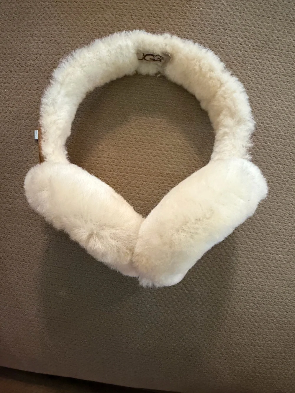 UGG Cream Shearling Ear Warmers with headphone plug-in